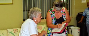Signing Up Elderly Woman